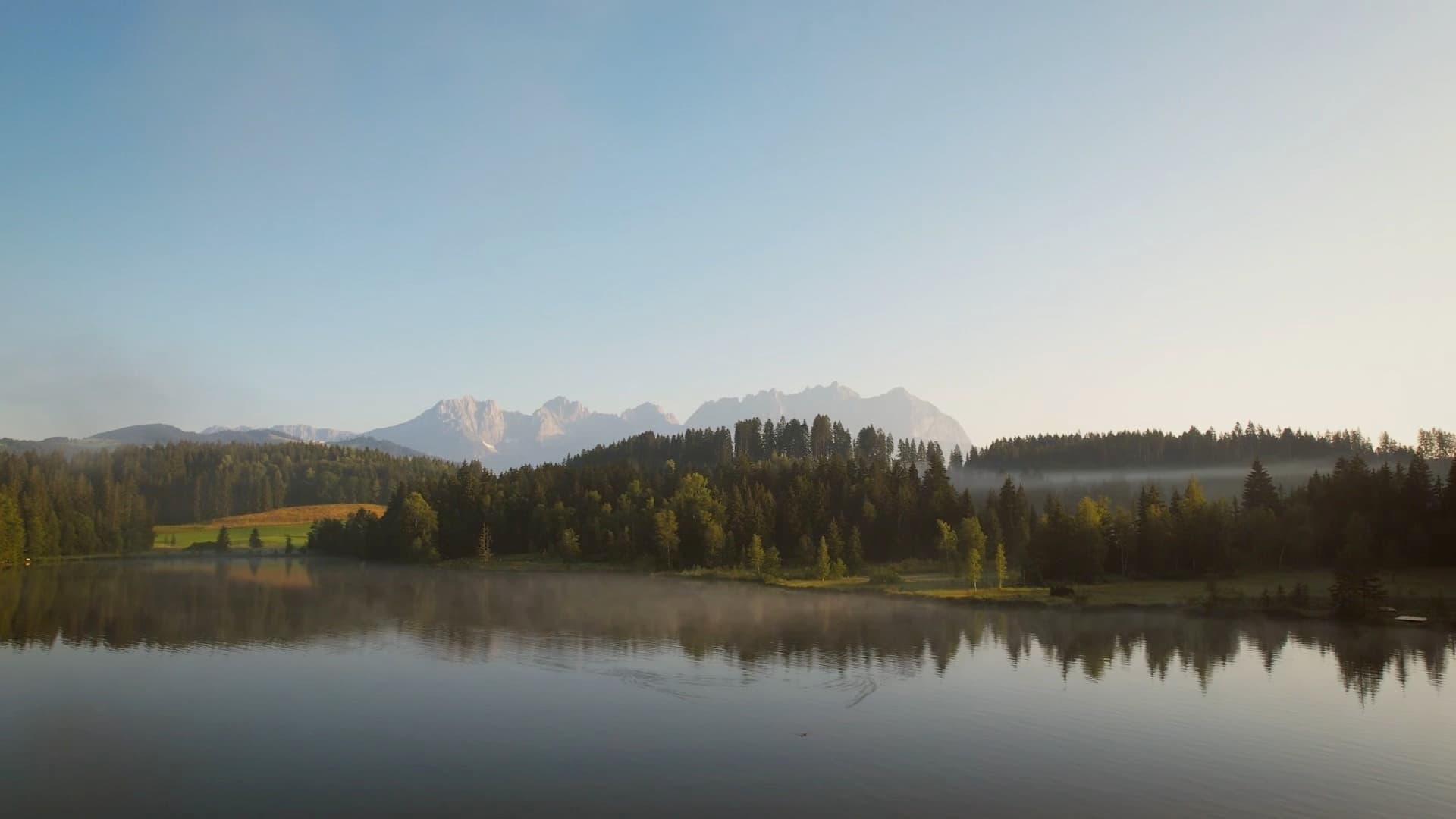 Lake Schwarzsee near Kitzbühel with the Wilder Kaiser mountains